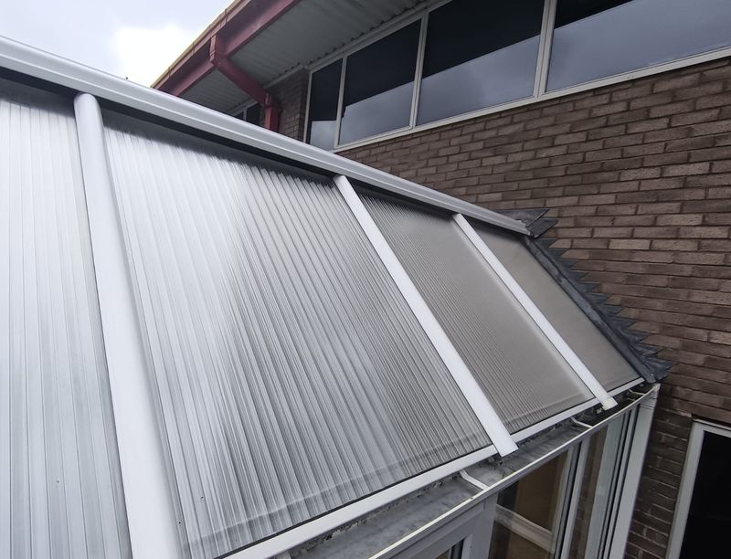 The same conservatory roof after cleaning, every panel clear and bright