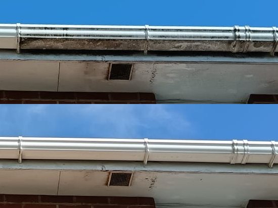A gutter front and soffit, streaked black before cleaning on the top, and clean white after on the bottom